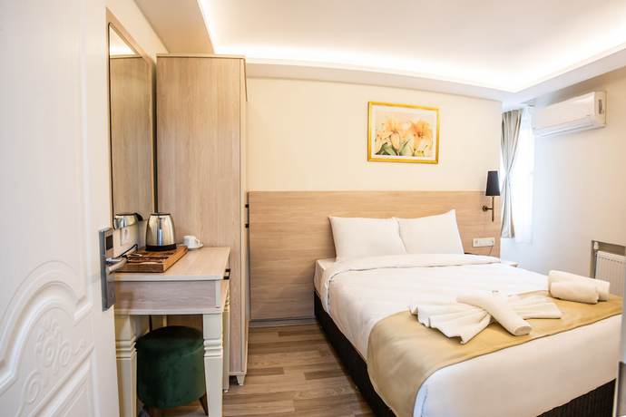 Imagen de la habitación del Royal Bosphorus Hotel. Foto 10