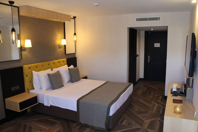 Imagen de la habitación del Royal Cesme Hotel. Foto 11