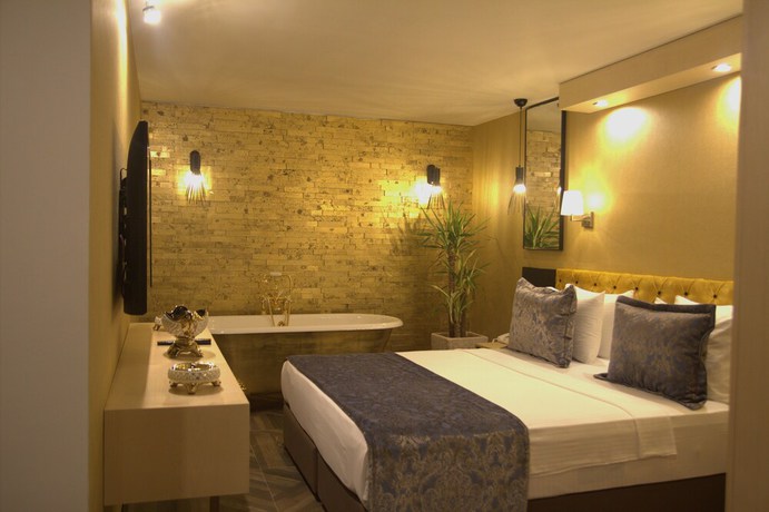 Imagen de la habitación del Royal Cesme Hotel. Foto 12