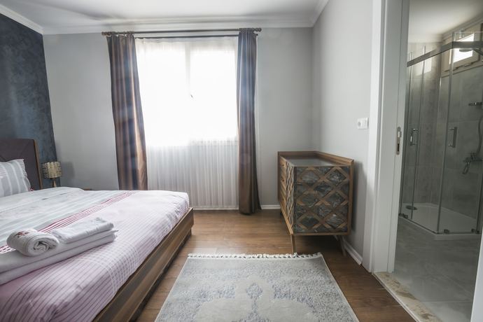 Imagen de la habitación del Royal Comfort Suites. Foto 7