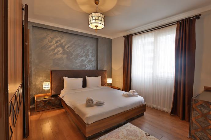 Imagen de la habitación del Royal Comfort Suites. Foto 8