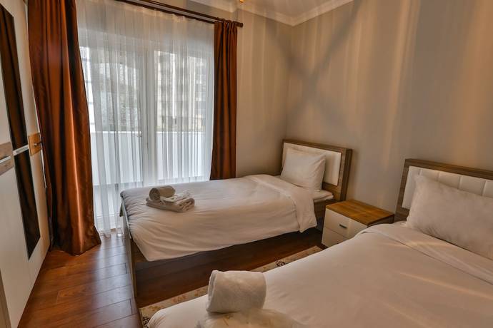 Imagen de la habitación del Royal Comfort Suites. Foto 16