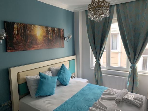 Imagen de la habitación del Royal Family Hotel. Foto 11