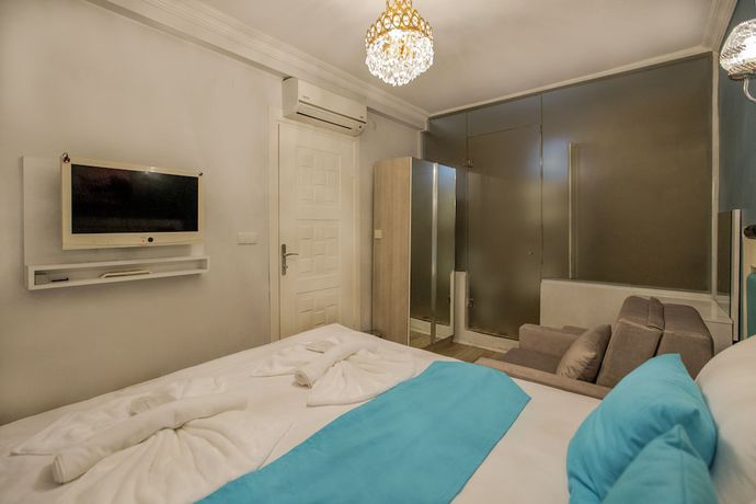 Imagen de la habitación del Royal Family Hotel. Foto 13