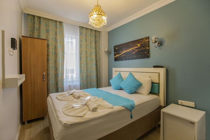 Imagen de la habitación del Royal Family Hotel. Foto 14