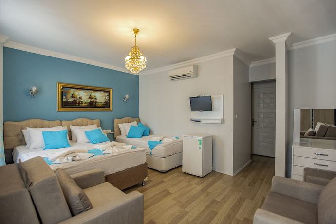 Imagen de la habitación del Royal Family Hotel. Foto 15