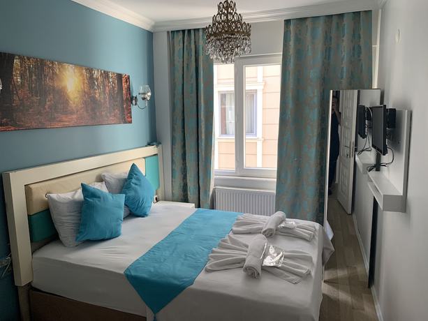 Imagen de la habitación del Royal Family Hotel. Foto 16