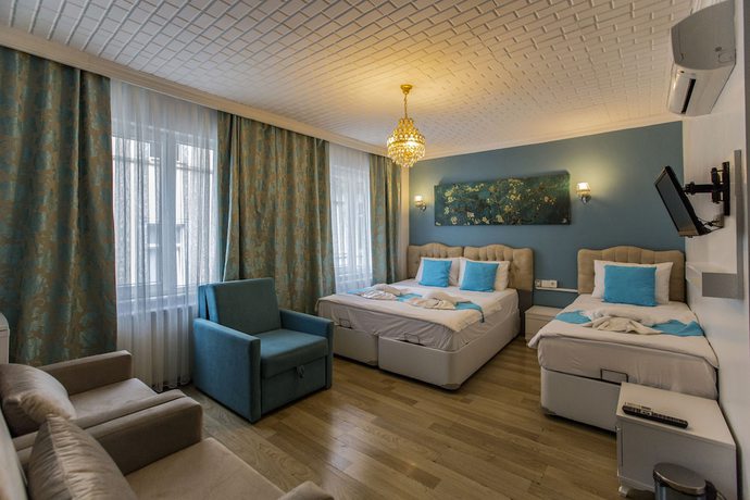 Imagen de la habitación del Royal Family Hotel. Foto 19