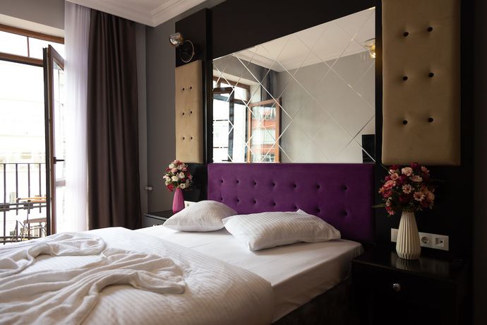 Imagen de la habitación del Royal Garden Suite Hotel. Foto 4