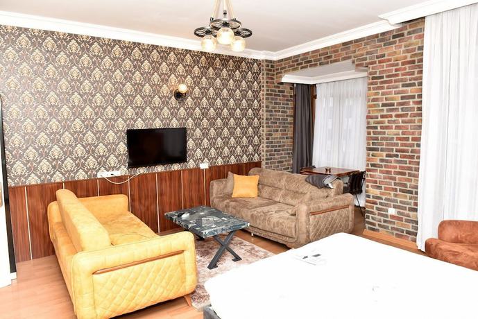 Imagen de la habitación del Royal Garden Suite Hotel. Foto 6