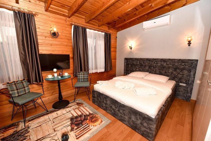 Imagen de la habitación del Royal Garden Suite Hotel. Foto 7