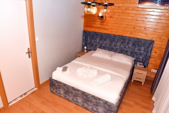 Imagen de la habitación del Royal Garden Suite Hotel. Foto 12