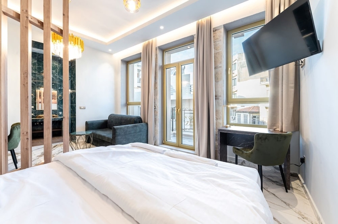 Imagen de la habitación del Royal Gold City Suites by Omilos Hotels. Foto 16
