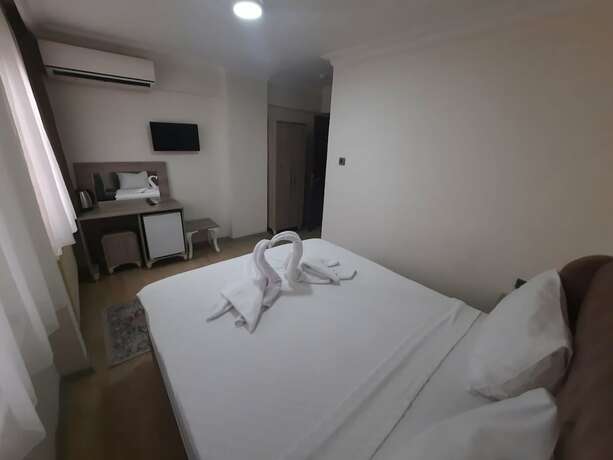 Imagen de la habitación del Royal Gur Hotel. Foto 17