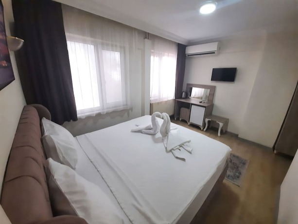 Imagen de la habitación del Royal Gur Hotel. Foto 18