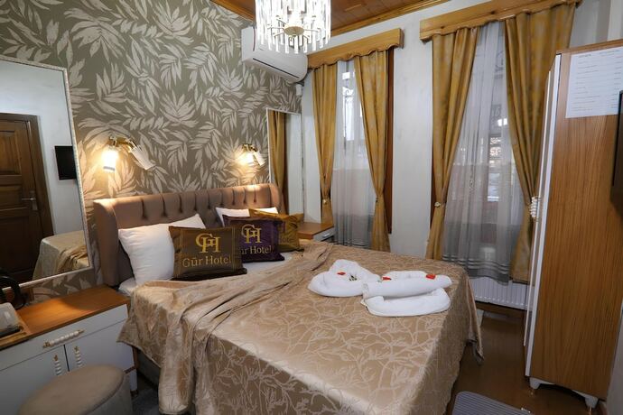 Imagen de la habitación del Royal Gur Hotel. Foto 19
