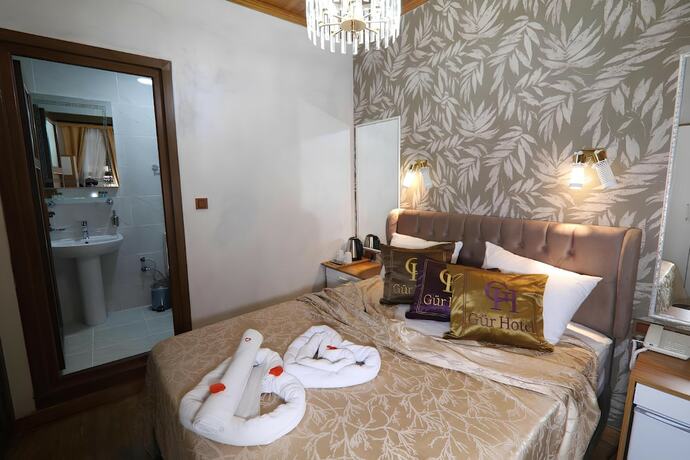 Imagen de la habitación del Royal Gur Hotel. Foto 20