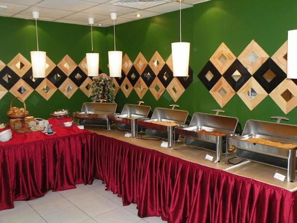 Imagen del bar/restaurante del Royal Mark Hotel Apartment Dubai. Foto 2