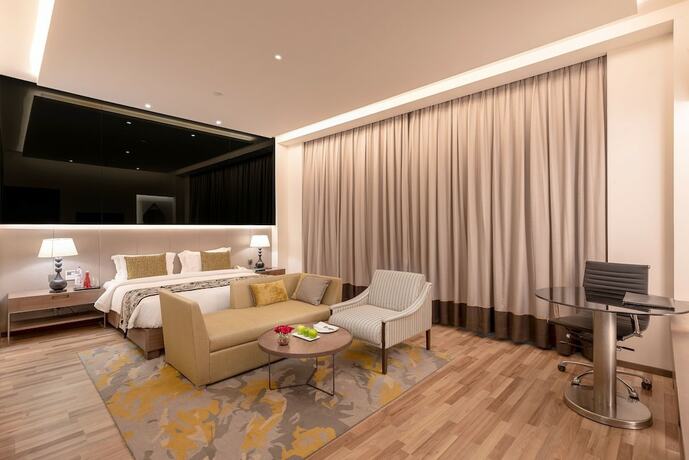 Imagen de la habitación del Rpj Hotel Rajkot. Foto 14