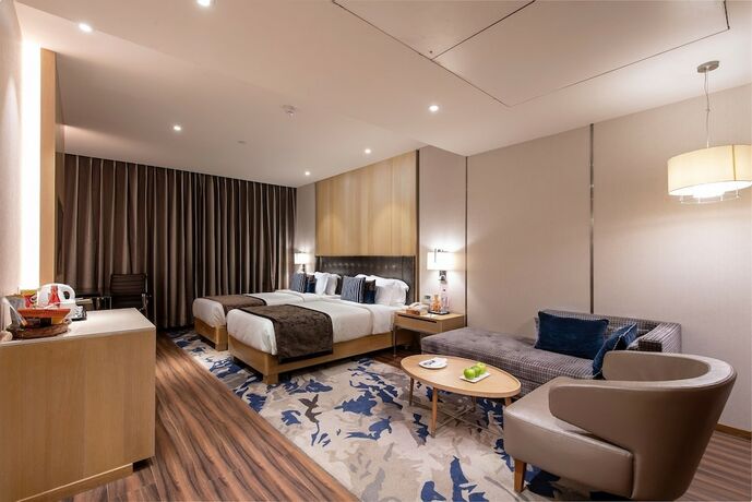 Imagen de la habitación del Rpj Hotel Rajkot. Foto 15