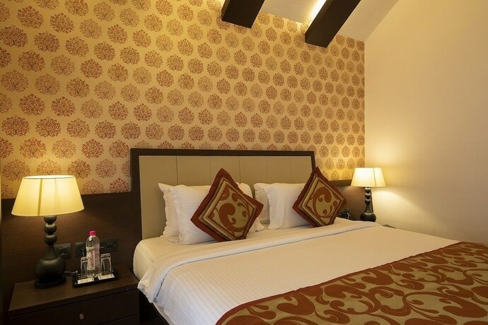 Imagen de la habitación del Rpj Hotel Rajkot. Foto 17