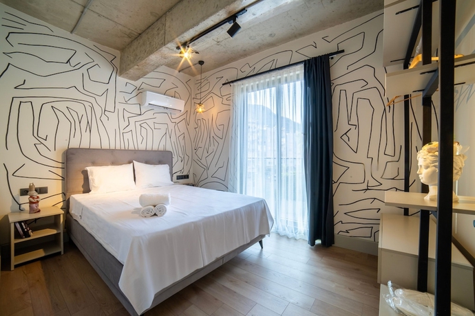Imagen de la habitación del Rudblu Suites. Foto 4