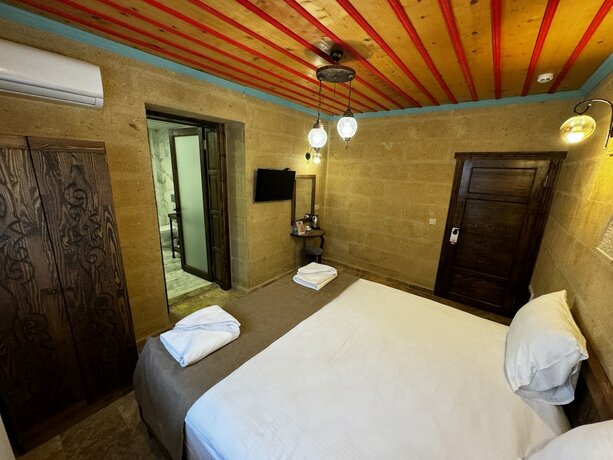 Imagen de la habitación del Rustic Caves Hotel. Foto 13