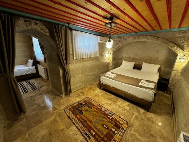Imagen de la habitación del Rustic Caves Hotel. Foto 15