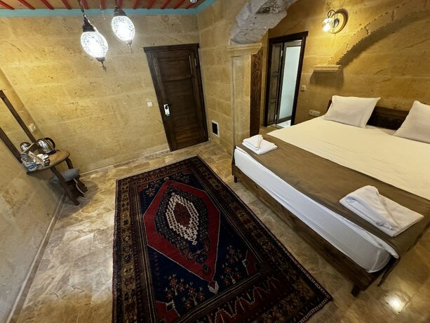 Imagen de la habitación del Rustic Caves Hotel. Foto 16
