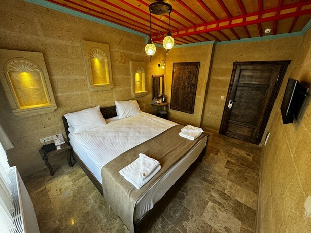 Imagen de la habitación del Rustic Caves Hotel. Foto 17