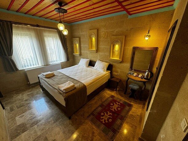 Imagen de la habitación del Rustic Caves Hotel. Foto 19