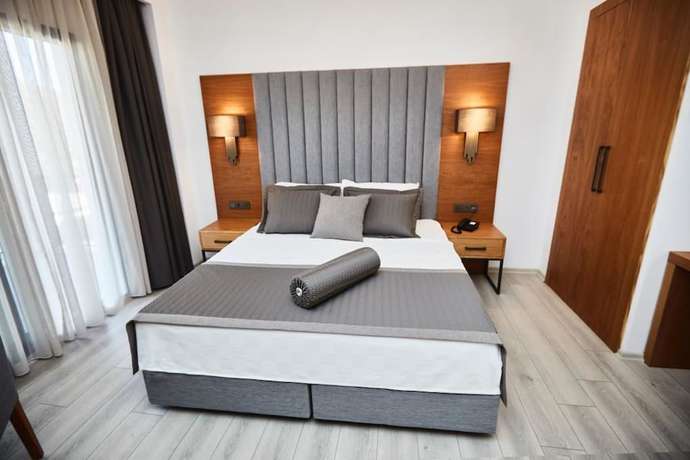 Imagen de la habitación del Ruwais Hotel. Foto 15