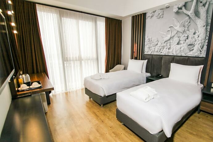 Imagen de la habitación del S Class Hotel Convention Center. Foto 7