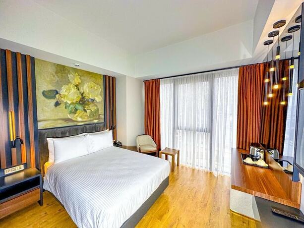 Imagen de la habitación del S Class Hotel Convention Center. Foto 9
