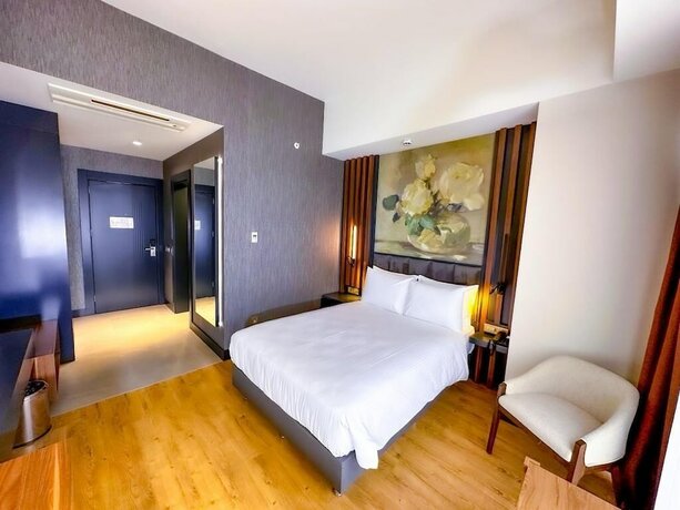 Imagen de la habitación del S Class Hotel Convention Center. Foto 10