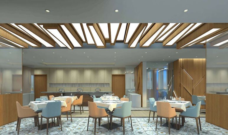 Imagen del bar/restaurante del S19 Hotel Al Jaddaf. Foto 3