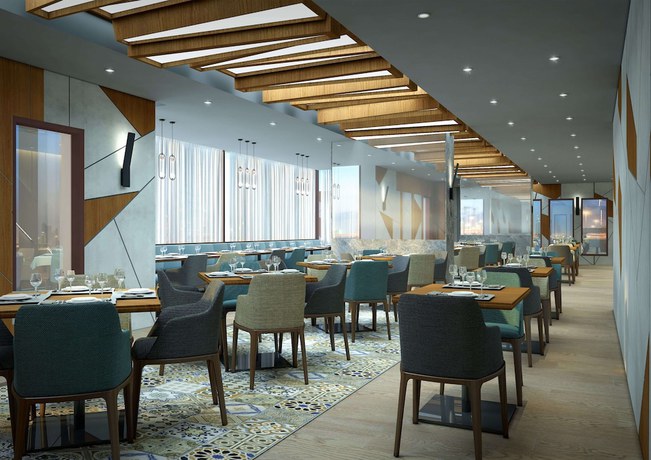 Imagen del bar/restaurante del S19 Hotel Al Jaddaf. Foto 5