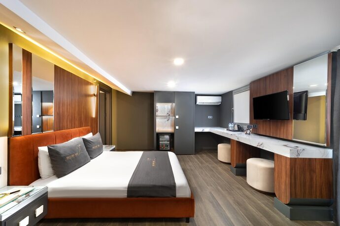 Imagen de la habitación del SECOND SUIT OTEL. Foto 19