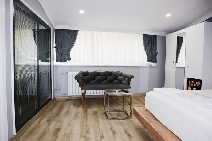 Imagen de la habitación del SERENITY SUIT HOTEL BAKIRK&Ouml;Y. Foto 5