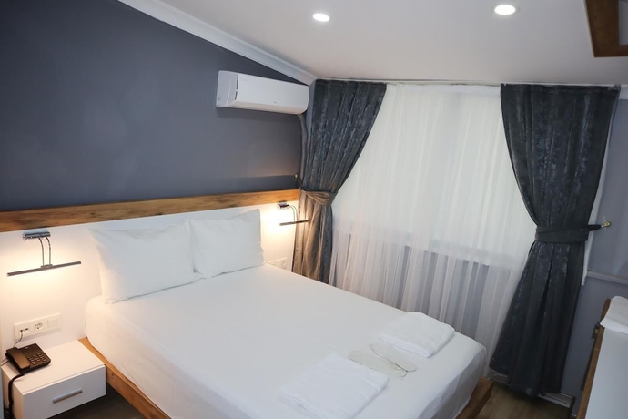 Imagen de la habitación del SERENITY SUIT HOTEL BAKIRK&Ouml;Y. Foto 7