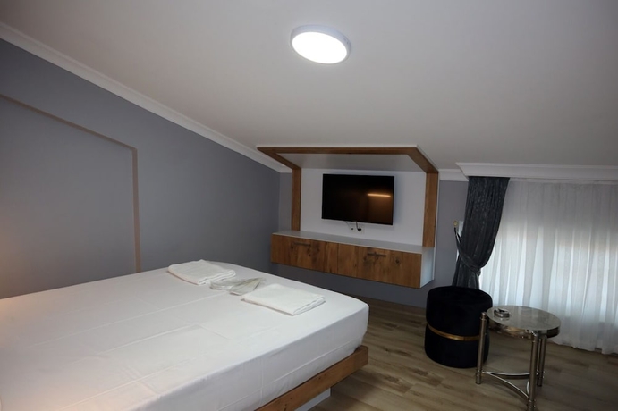 Imagen de la habitación del SERENITY SUIT HOTEL BAKIRK&Ouml;Y. Foto 9