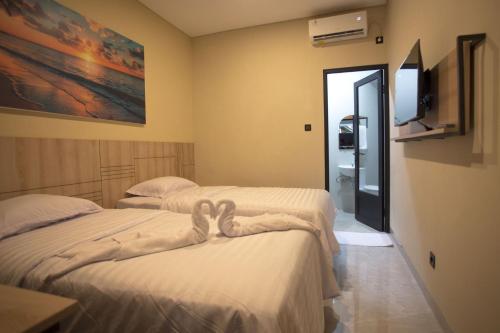 Imagen de la habitación del SH Hotel, Pangandaran. Foto 14