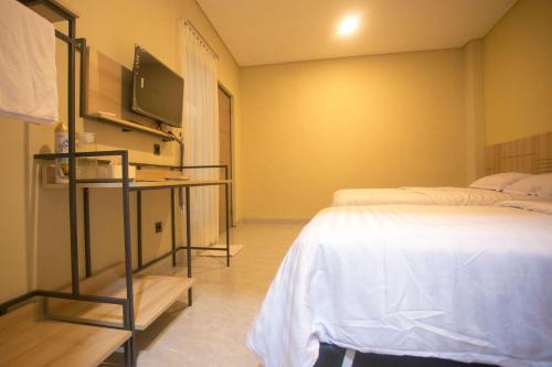 Imagen de la habitación del SH Hotel, Pangandaran. Foto 17