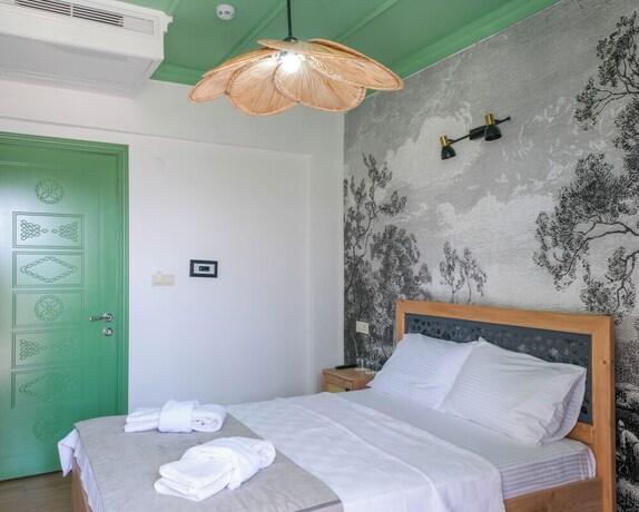 Imagen de la habitación del SIĞACIK GAEA HOTEL. Foto 20