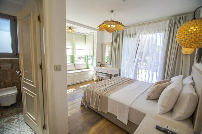 Imagen de la habitación del SOL DE VERANO BOUTIQUE HOTEL. Foto 17