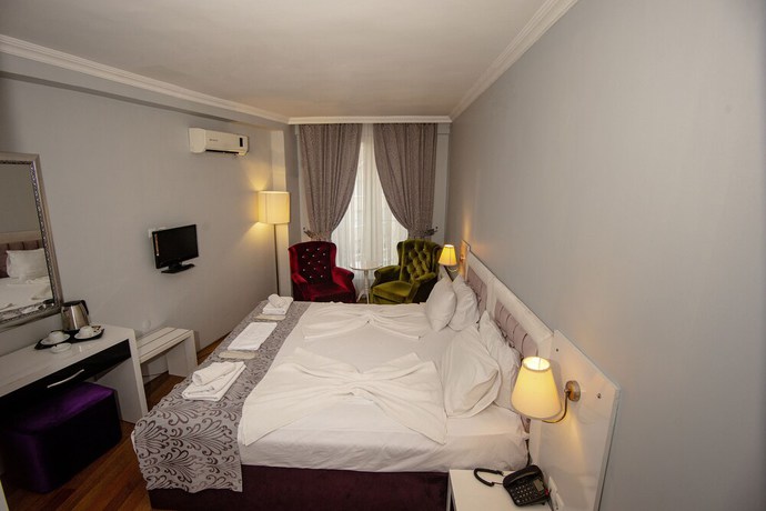 Imagen de la habitación del SRF Hotel. Foto 15