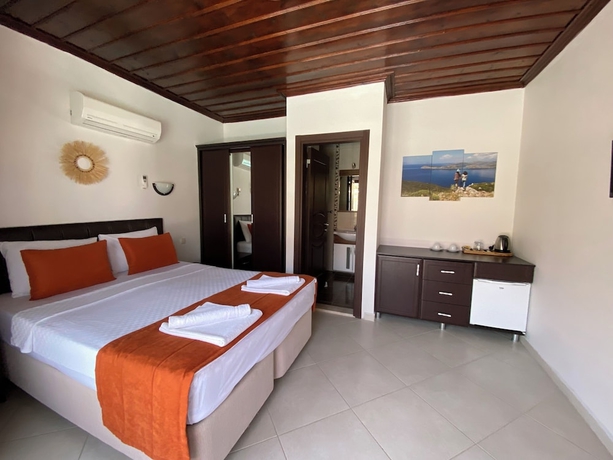 Imagen de la habitación del SUNA HOUSE. Foto 5