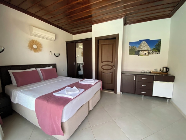 Imagen de la habitación del SUNA HOUSE. Foto 10