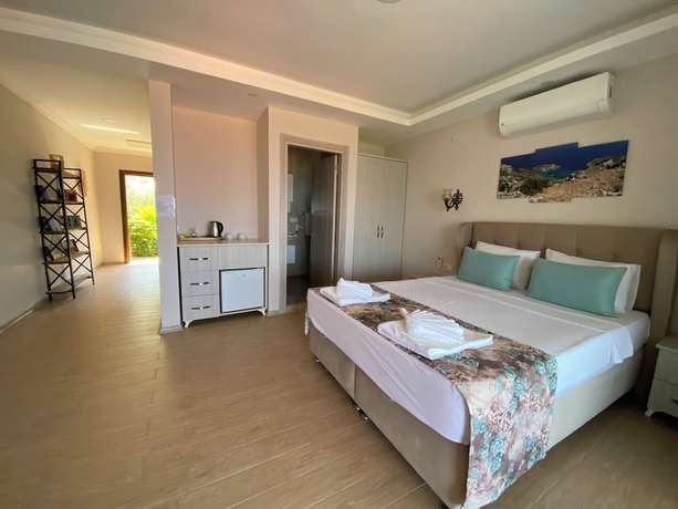 Imagen de la habitación del SUNA HOUSE. Foto 11