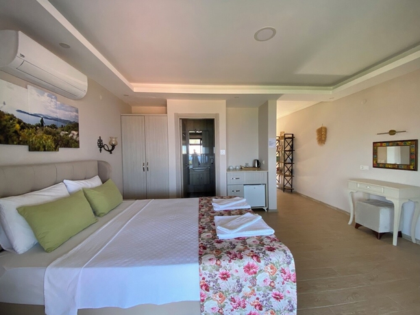 Imagen de la habitación del SUNA HOUSE. Foto 14